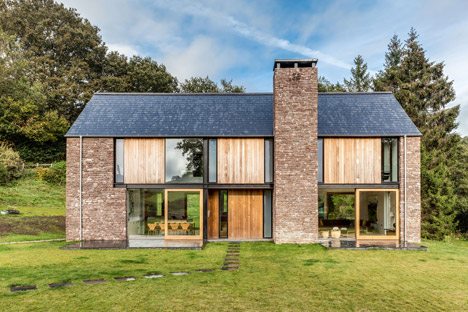 Sandstone-clad House In Wales Designed By Hall + Bednarczyk To Resemble Local Barns