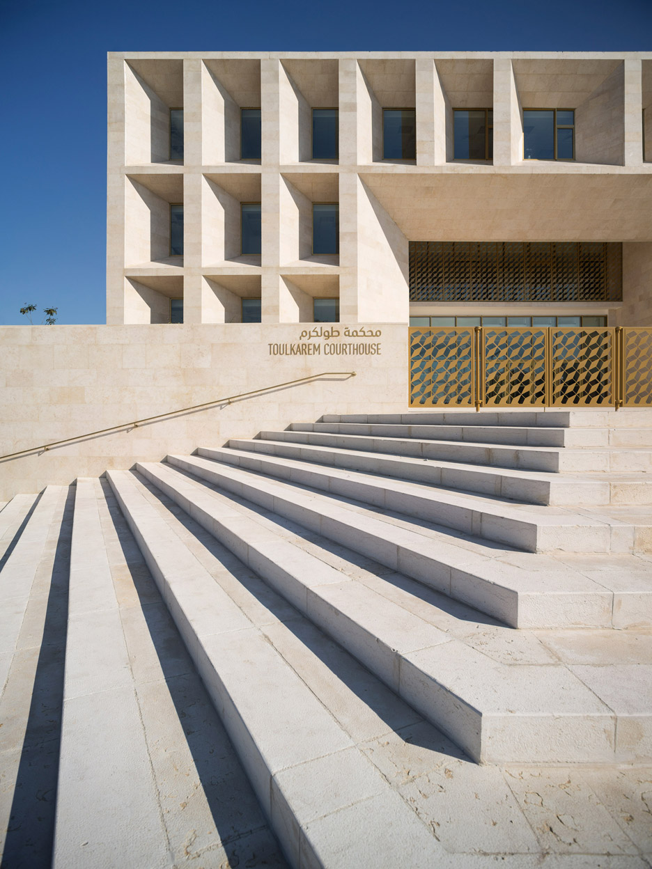 AAU Anastas Completes Palestinian Courthouse Featuring Stone Walls And Golden Latticework