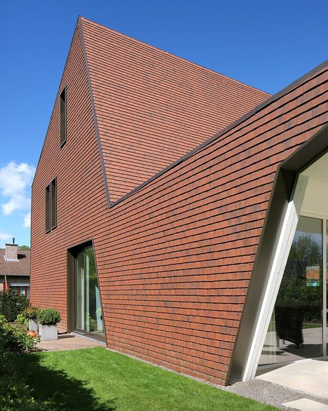 Villa Willemsdorp By Dieter De Vos Features A Lopsided Gable And Walls Clad With Roof Tiles