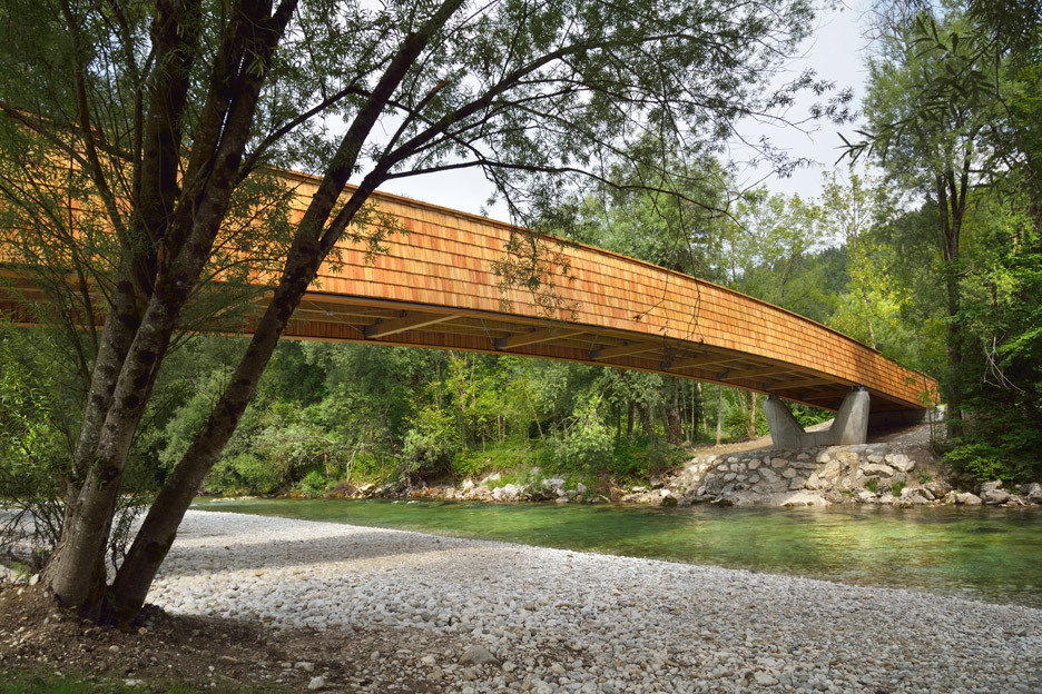 Arching Wooden Footbridge By DANS Architects Connects Slovenian Village To Mountains