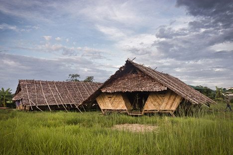 Teak And Bamboo Structures Accommodate Burmese Refugees In A Thai Village