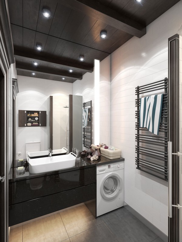 The tiled bathroom is not quite as decadent, but does manage to slip a washing machine under the counter, which is quite convenient in an apartment this size.