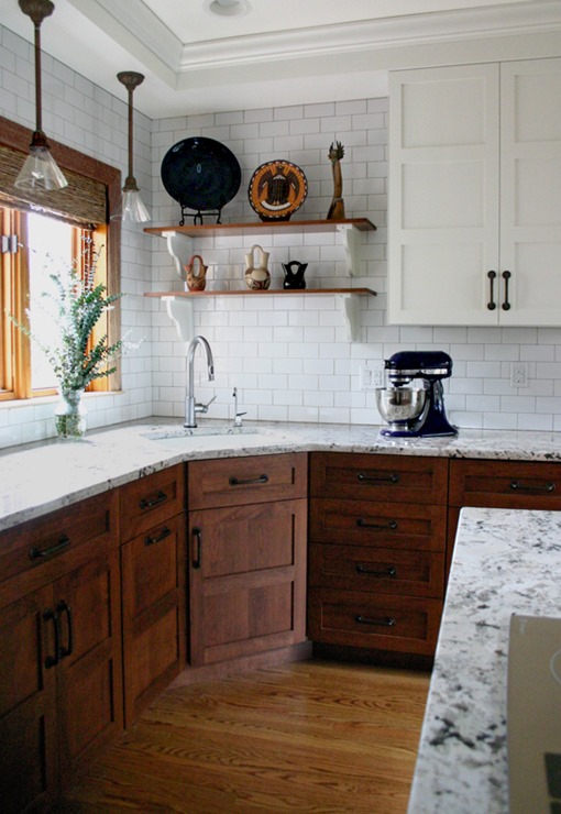 stained wood lower cabinets white uppers