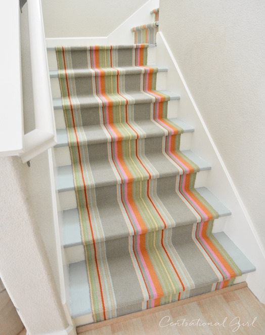 striped runner on painted staircase
