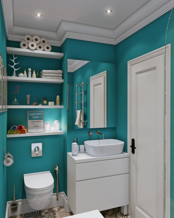 The bathroom is beautiful in a bright and boisterous teal.